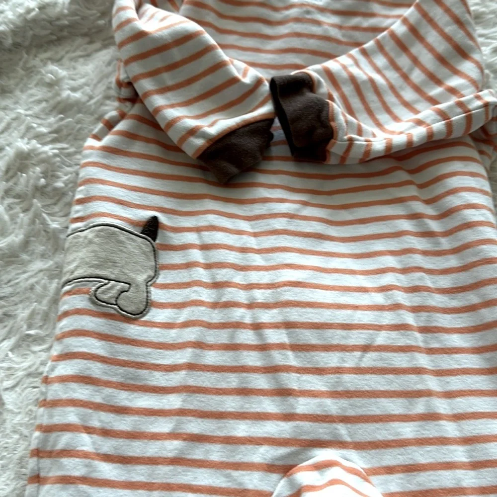 Cute as a button onesie with doggie print